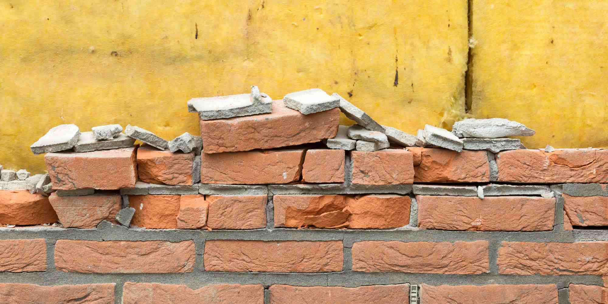 isoler un mur en brique